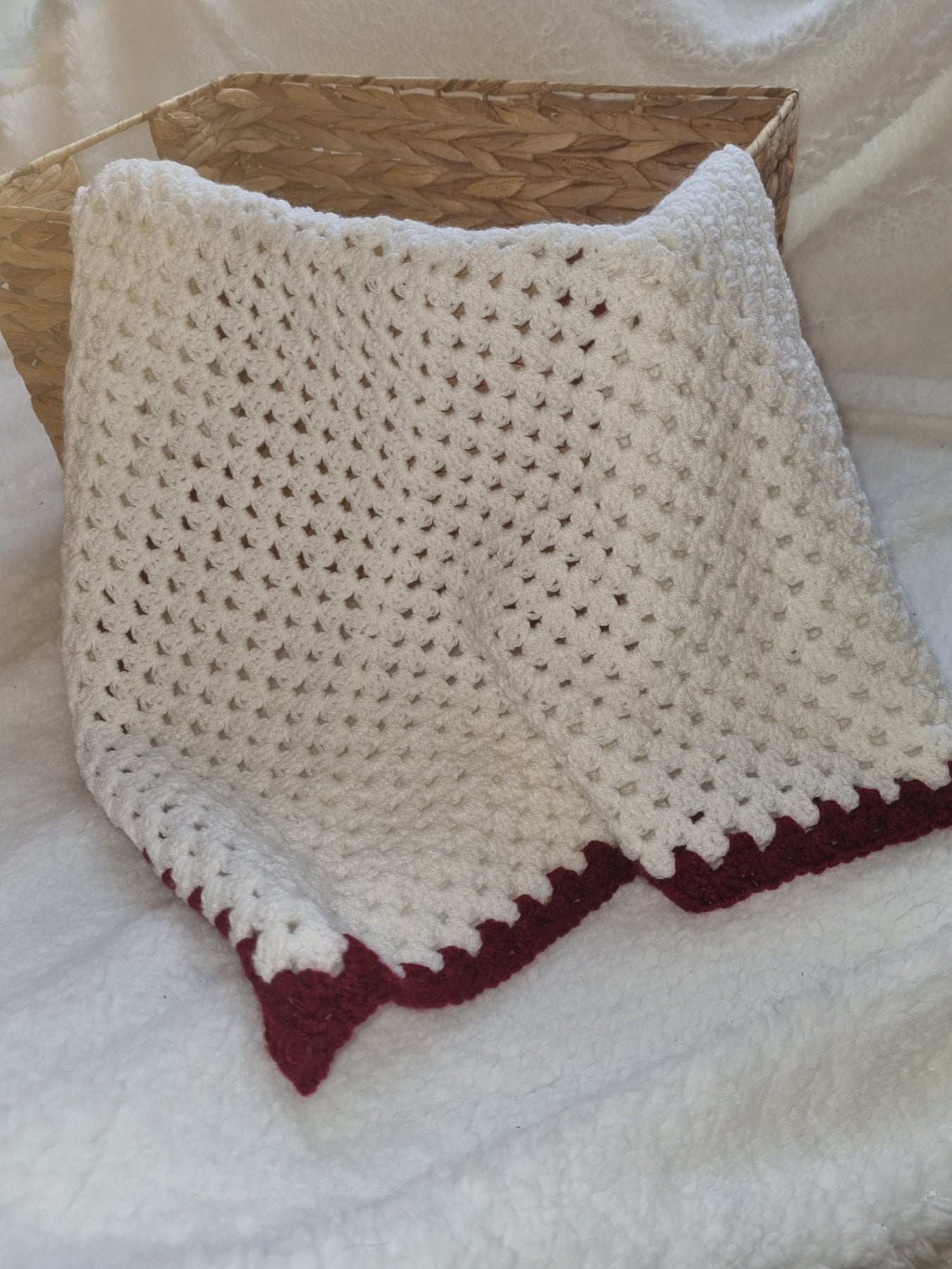 White granny square, trimmed in burgundy