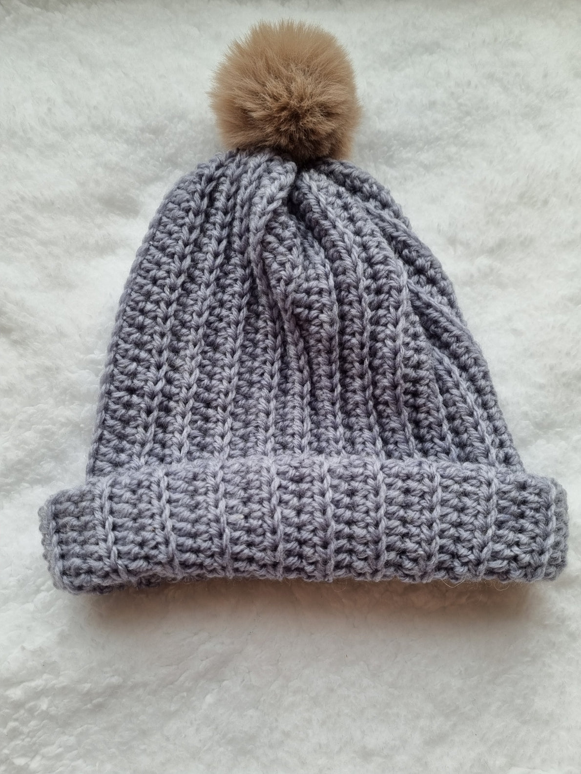 Grey, with pale brown pompom, hat