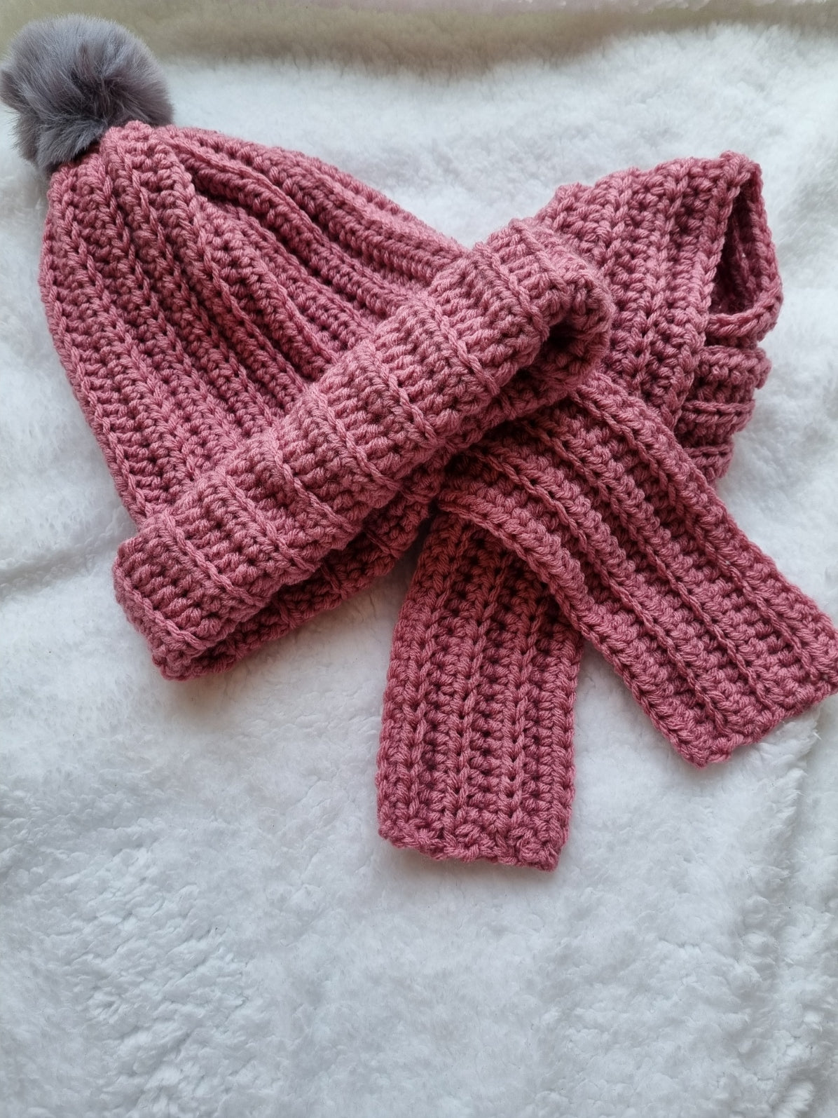 Crocheted, pink hat and scarf set