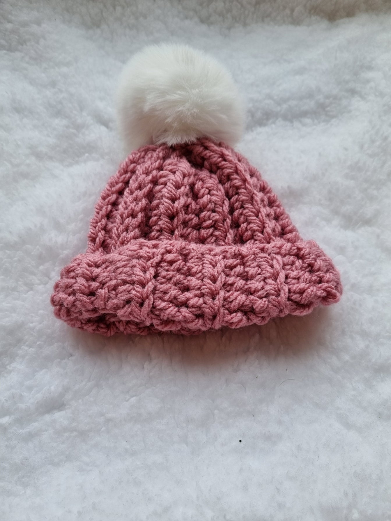 Pink with white faux pompom