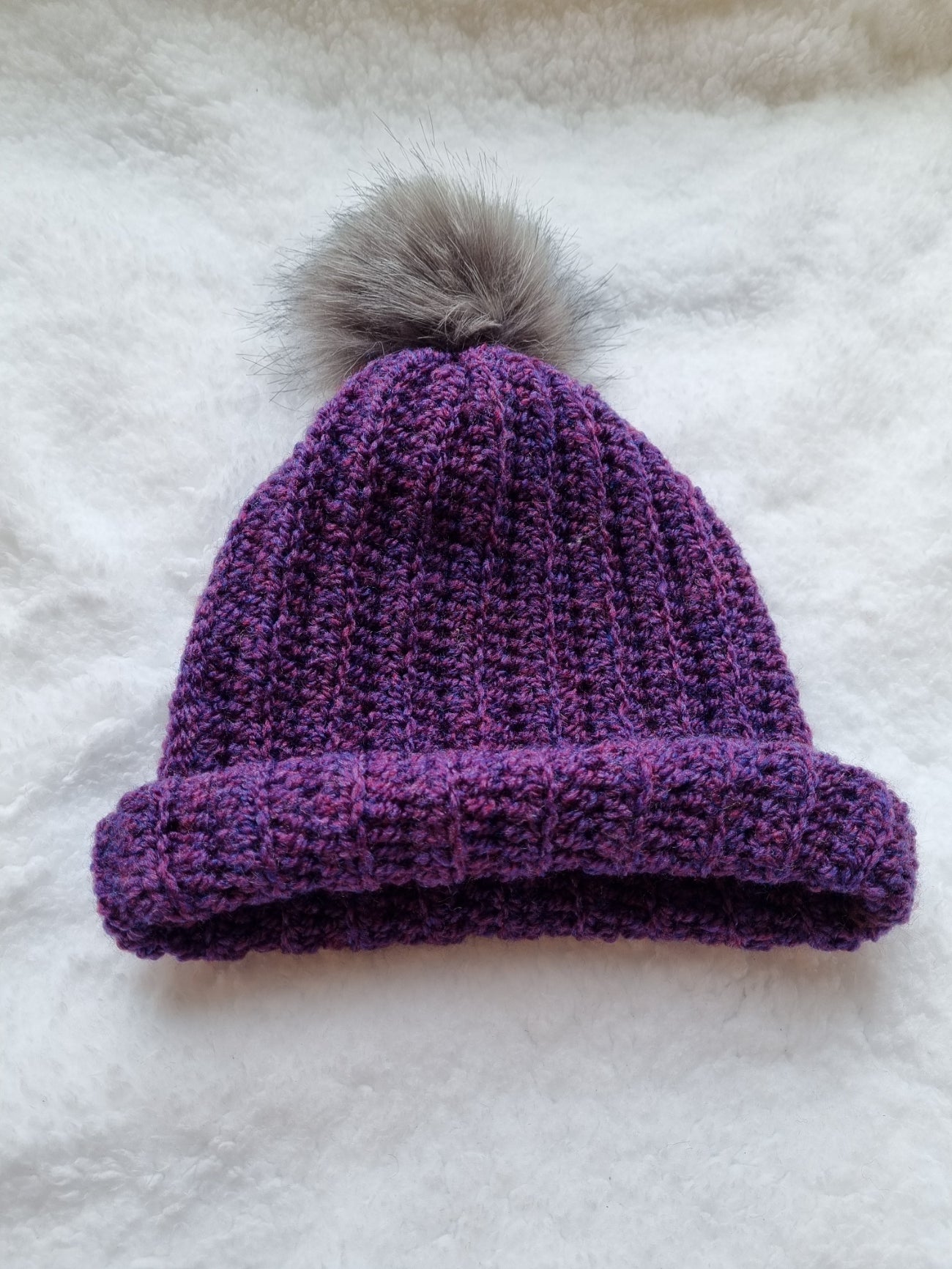 Purple fleck hat, with grey faux pompom